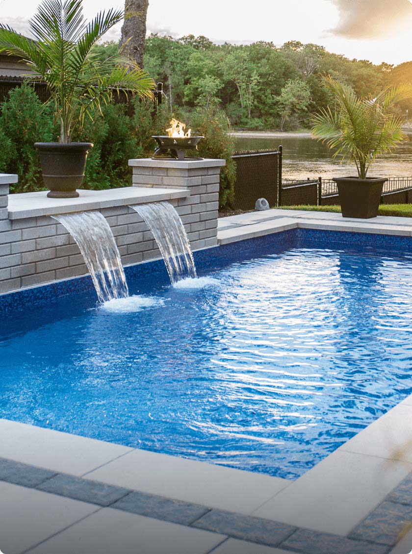 tranquil backyard with stone work, water features and plunge pool